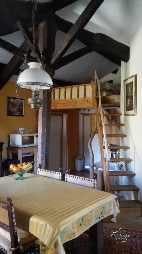 Coin repas et mezzanine appartement proprio